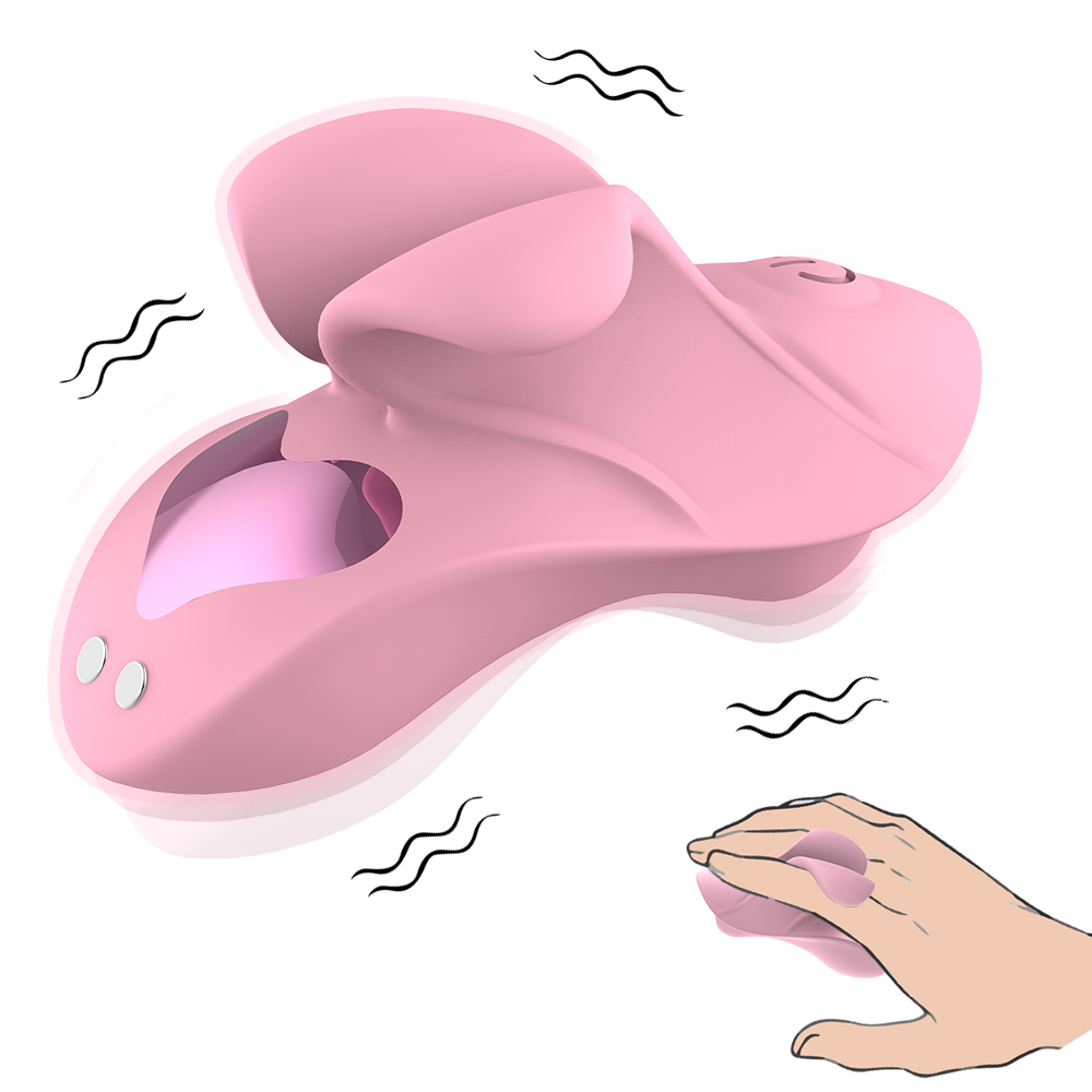 A pink silicone adult toy with a unique shape and vibrating features is depicted. A hand is shown pressing a part of the toy, suggesting its vibrational function. The toy has a cut out section and two buttons on the front.