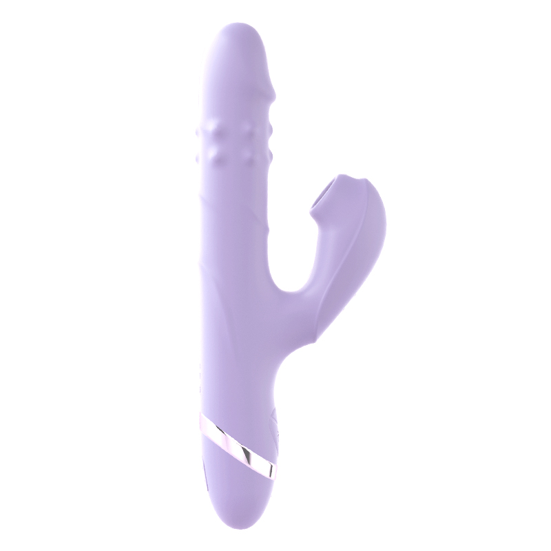 A light purple silicone vibrator with a curved, ribbed design and an additional clitoral stimulator attachment. The base features a silver accent ring. The vibrator stands upright against a white background.